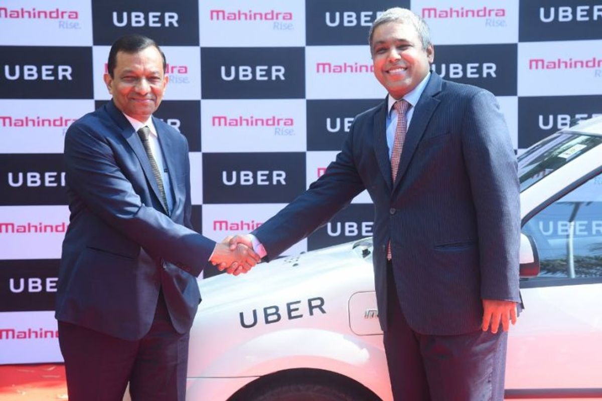 Mahindra And Uber Join Hands To Deploy EV Cabs In Delhi, Hyderabad Mahindra And Uber Join Hands To Deploy EV Cabs In Delhi, Hyderabad