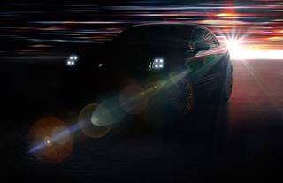 New Porsche Macan SUV teased ahead of its debut LA Motor Show