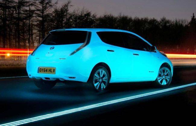 Glow-in-the-dark Nissan Leaf Drives On Glowing Smart Highway | CarDekho.com