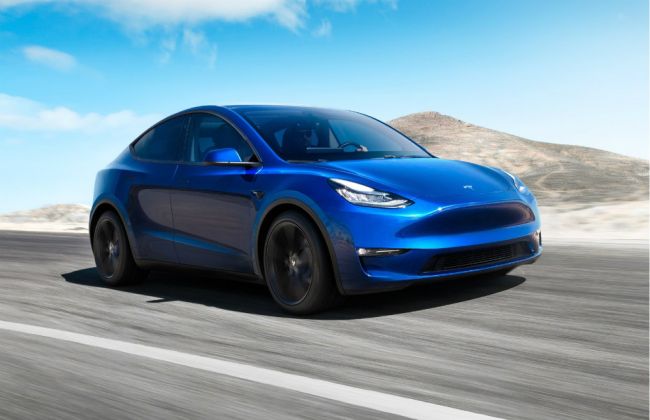 Tesla Model Y Electric SUV Revealed - Will It Come To India? | CarDekho.com