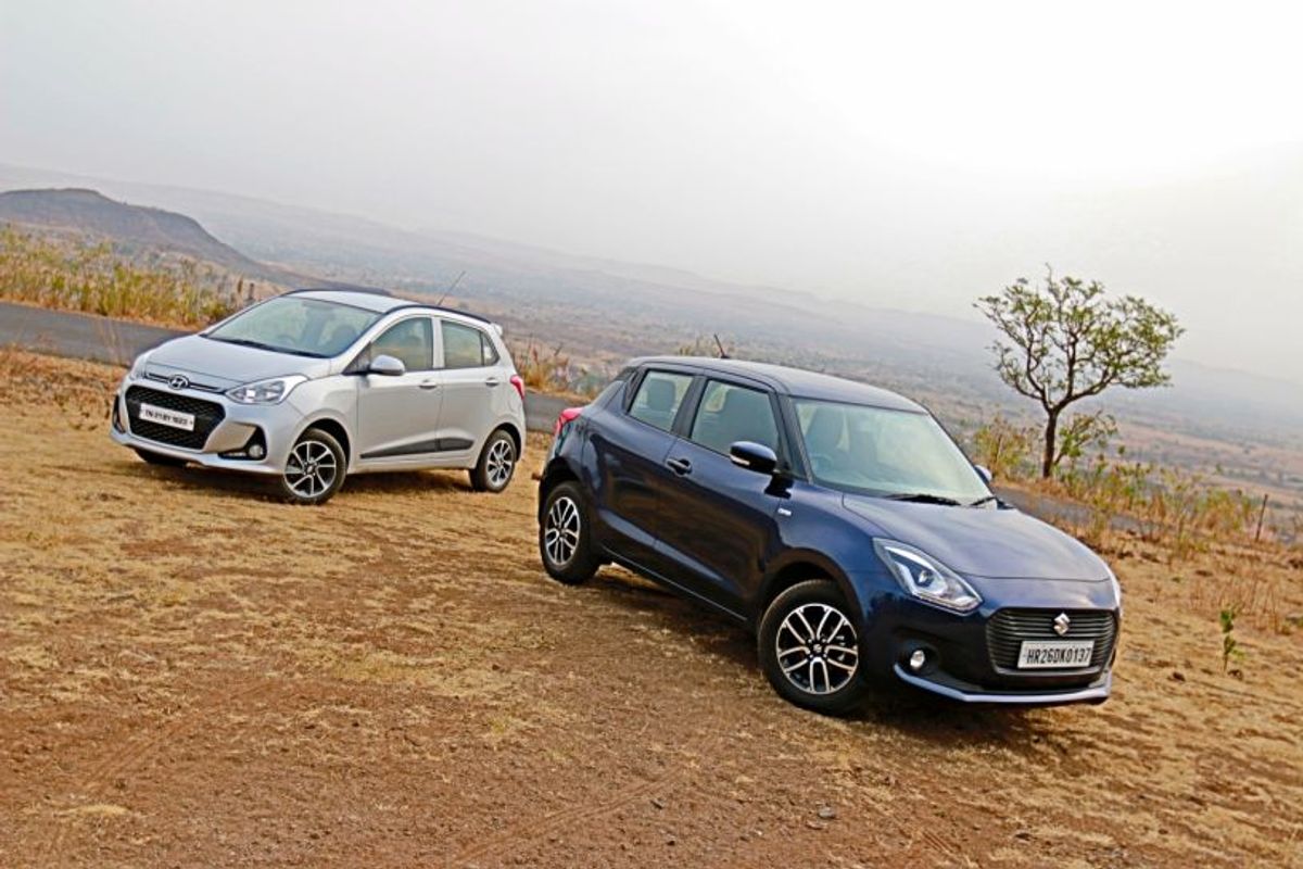 Maruti Suzuki Swift VS Hyundai Grand i10 Maruti Suzuki Swift VS Hyundai Grand i10