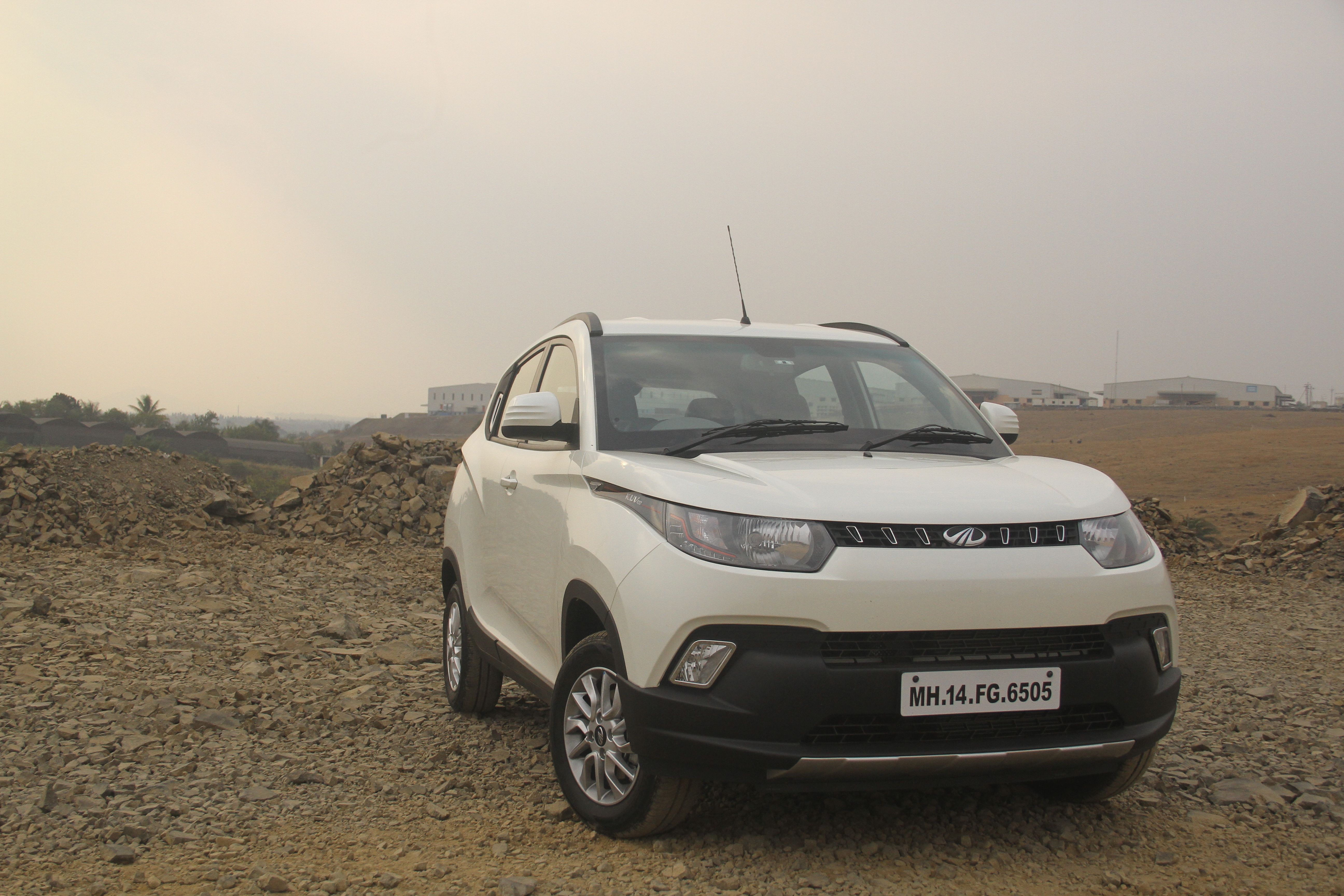 Mahindra KUV1OO : First Drive Review | Petrol and Diesel driven!