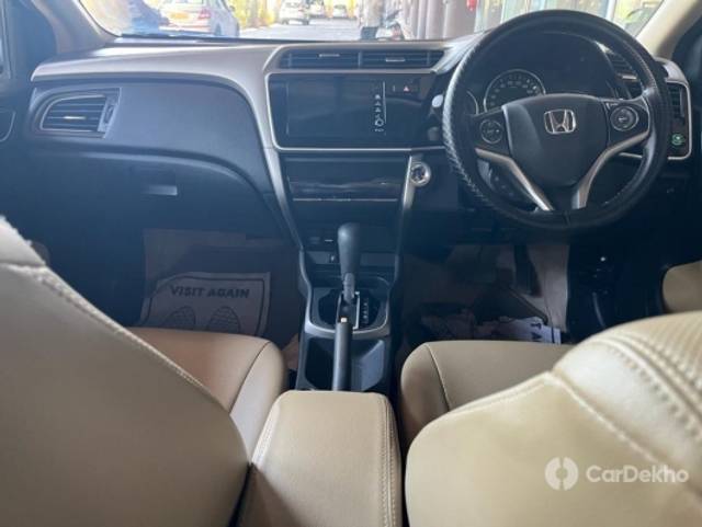 https://stimg2.cardekho.com/images/usedcarimages/large/3-2023/3641707/PHOTO-2023-02-23-19-22-08.jpg?imwidth=6401