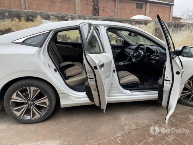 https://stimg2.cardekho.com/images/usedcarimages/large/3-2023/3655993/052F588E-5F81-4EE5-809C-CB5C6FE29E1C.jpg?imwidth=6401